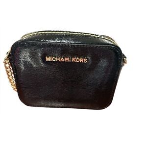 Michael Kors black patent leather crossbody bag with gold chain